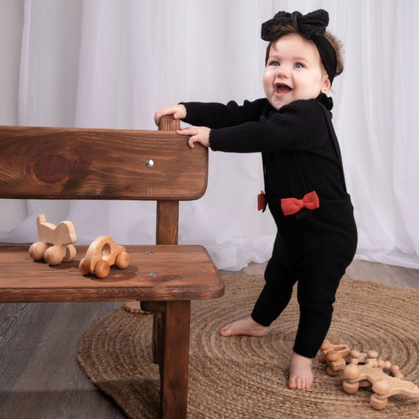 BOW KNIT ROMPER WITH BLACK RIBBED RUFFLED SWEATER